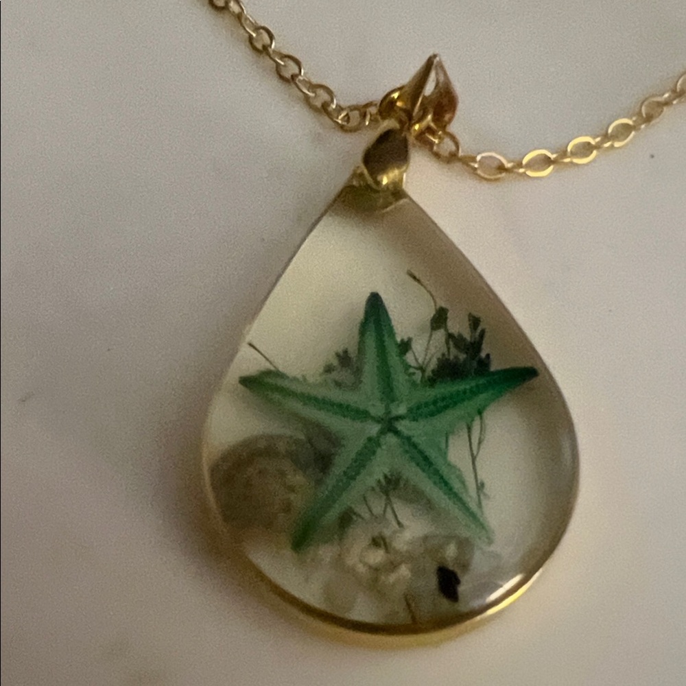 Gold Teardrop Pendant Necklace with Green Starfish